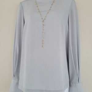 Women's long sleeve button back blouse